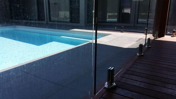 Michael Wheatley - Cleaning Swimming Pool Glass Panels